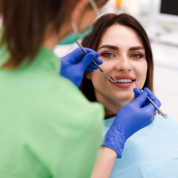 girl-with-a-beautiful-smile-at-the-dentist-s-appoi-2022-02-02-02-02-50-utc (1)