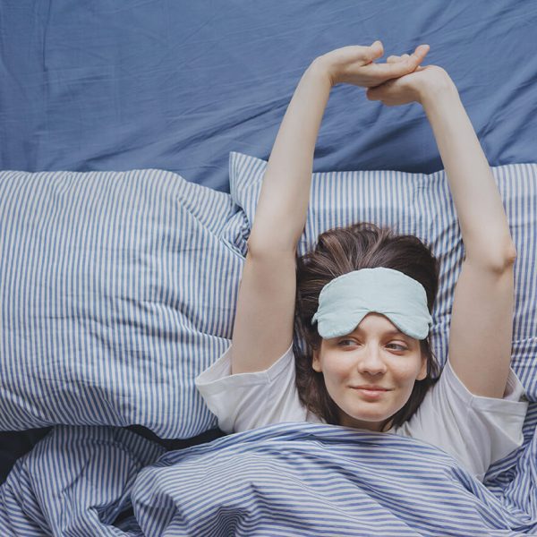 top-view-of-a-woman-in-bed-wearing-a-sleep-mask-a-2022-11-17-10-05-03-utc (1)